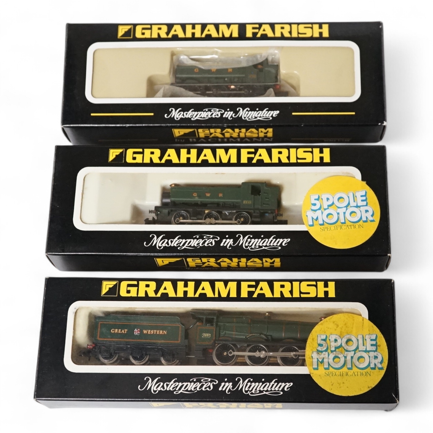 Three boxed Graham Farish N gauge GWR locomotives; a Hall class Raveningham Hall 8960 (1404), a class 94xx 9400 (1104), and a class 57xx 6752 (371926). Condition - good.